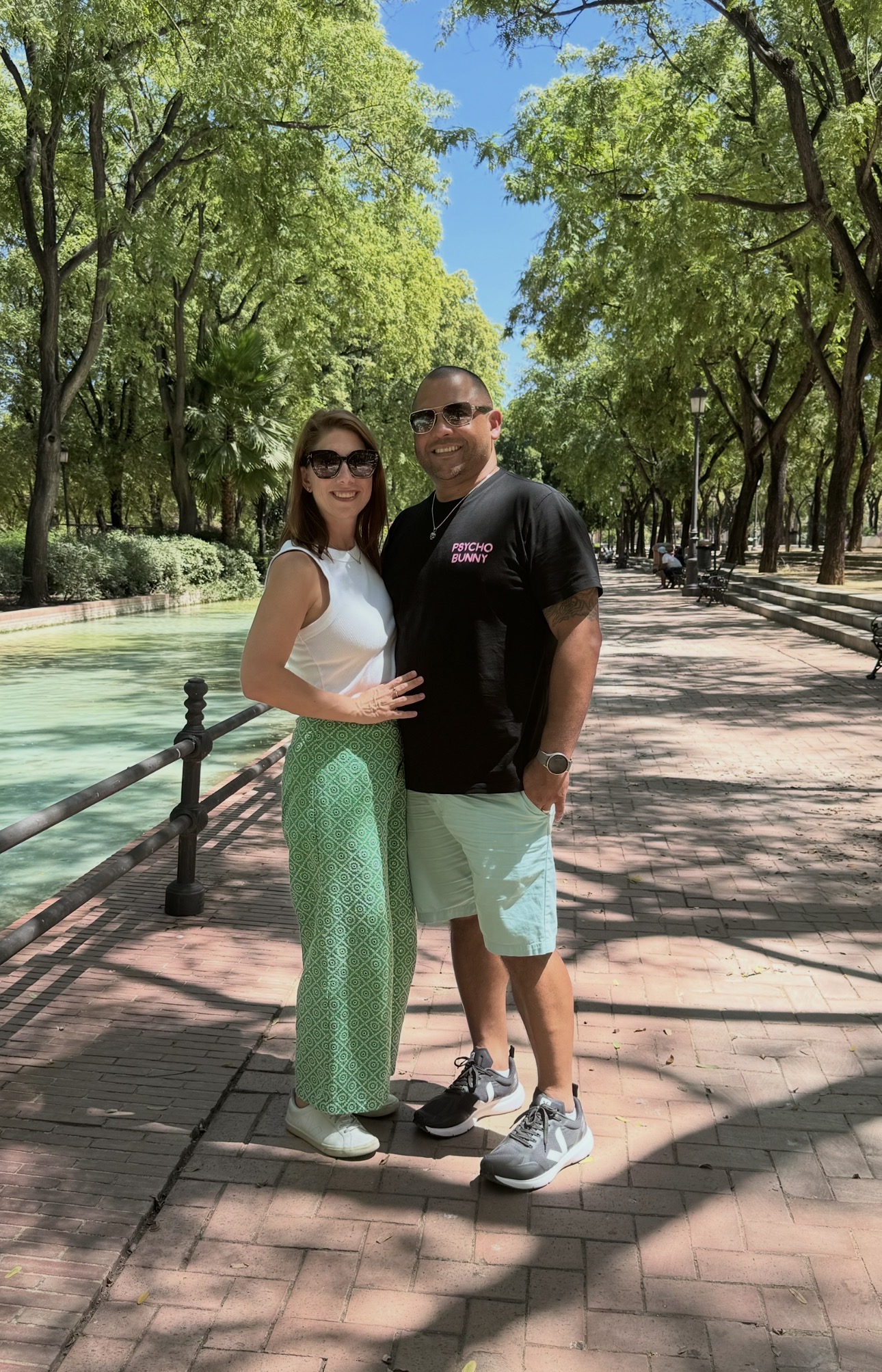 The founders of Landed Madrid in a tree-lined park in Madrid